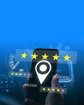 Feedback rating displayed on a smartphone inside a car at night with a clear blue background