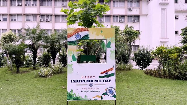 India Independence Day Celebration Standee Displayed in Green City Garden with Tricolor Decorations, Patriotic Design and Festive Outdoor Setting