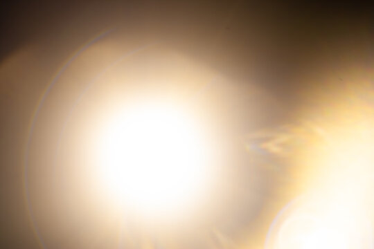 Sun flare on the black background