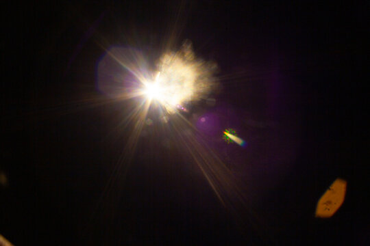 Sun flare on the black background