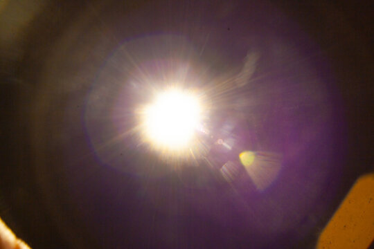 Sun flare on the black background