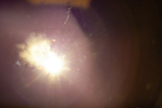 Sun flare on the black background