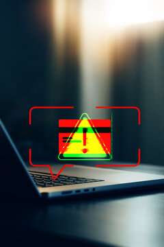 Warning sign displays on a laptop screen related to fake payment