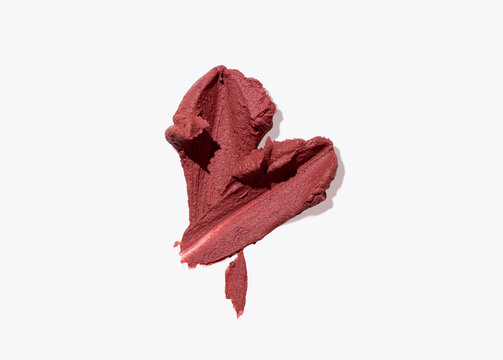Two lipstick swatches forming heart shape