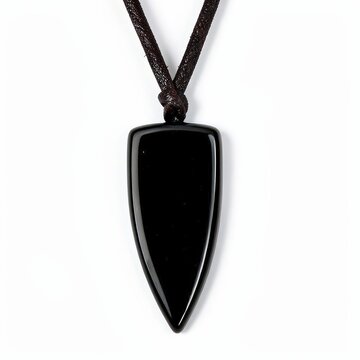 Glossy obsidian arrowhead pendant on leather cord, minimalist black gemstone necklace, tribal jewelry isolated on white background
