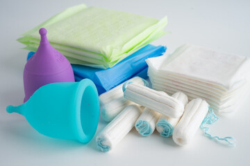 Menstruation cycle with sanitary pad and cotton tampon for woman hygiene and protection. © amazing studio