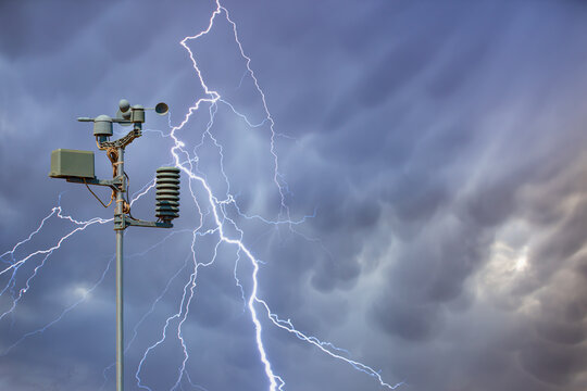 Weather station automatic measurement of weather parameters with Stormy sky and rain and lightning