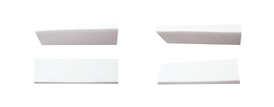 Four White Geometric Blocks on Black Background