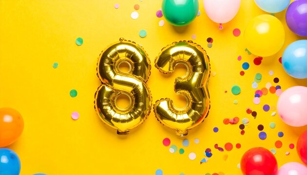 Gold Number 83 Foil Balloons with Colorful Confetti and Balloons