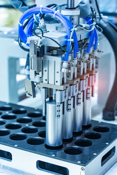 Automation system control application on automate robot arm at industrial manufacture factory of lithium battery
