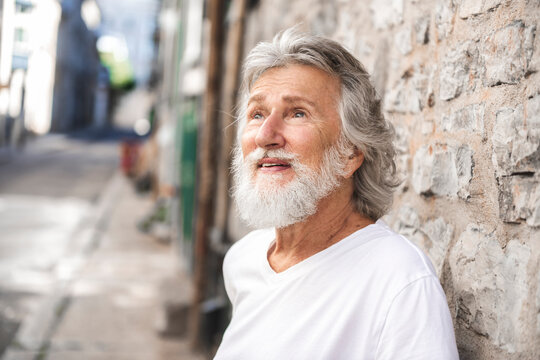 Senior man in the city urban backgroud having great time