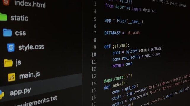 Python developer scrolling through flask web application code on a dark theme editor, showing the file structure, database connection, and routing for web development