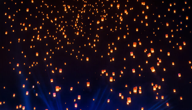 Tourist floating sky lanterns in Loy Krathong festival , Chiang Mai ,Thailand.