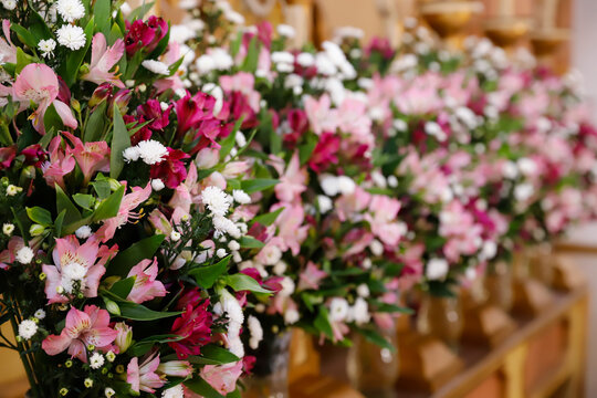 Elegant floral arrangement composed of alstroemeria flowers in pink and wine shades