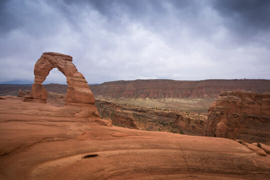 Delicate Arch, Arches National Park, Moab, Utah, United States of America. Natural beauty with dramatic skies.