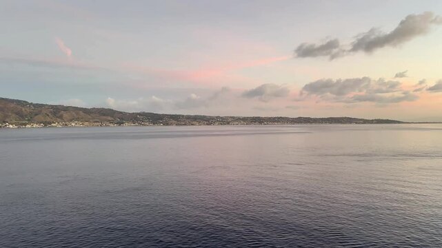 Panoramic Cruise Ship View Across the Strait of Messina at Sunrise
