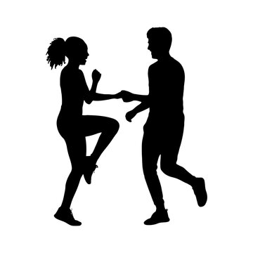 Couple dancing together in silhouette style