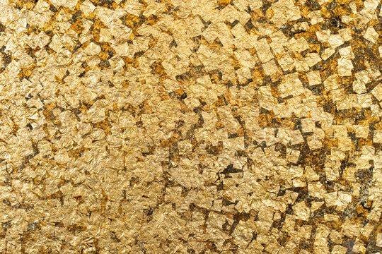 Traditional flat gold leaf metal texture background