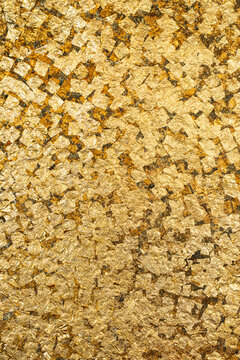 Traditional flat gold leaf metal texture background