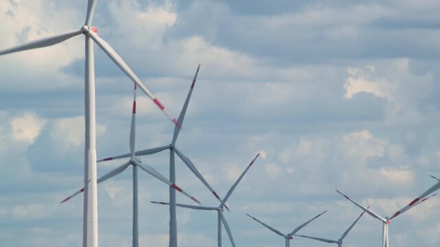 wind turbines against the sky 4K
