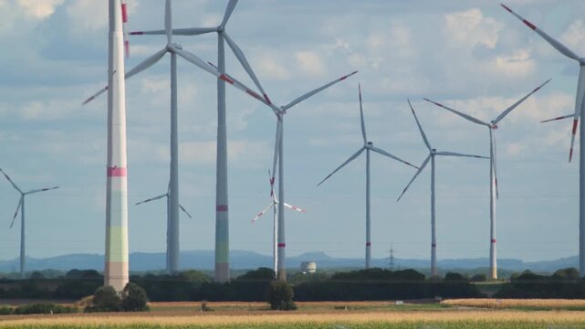 wind turbines against the sky 4K