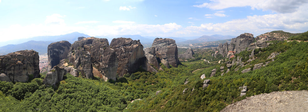 Breathtaking Meteora Panorama: Holy Monasteries and Sacred Cliffs