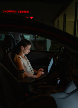 Mobile office setup in parked car after hours