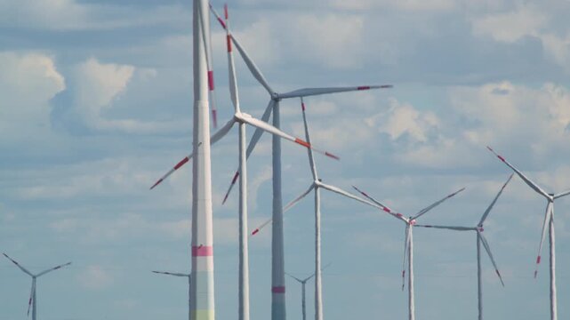 wind turbines against the sky 4K
