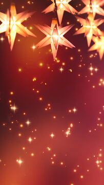 hanging christmas moravian star decoration isolated on blurred red background with sparks and copy space, vertical xmas greeting card concept for social media
