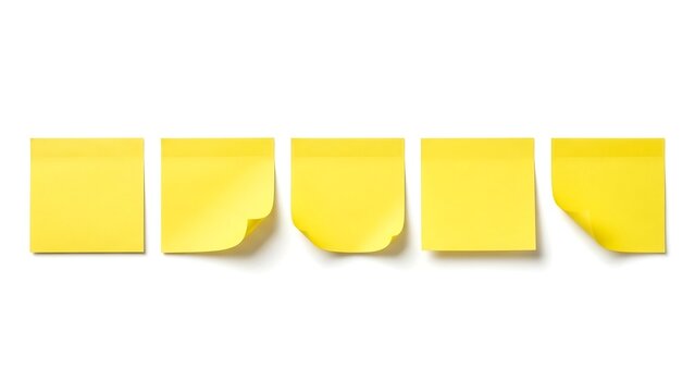 Five yellow sticky notes with various corners peeling off