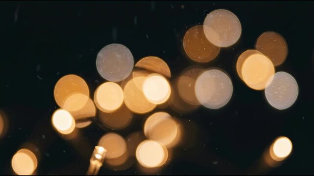 Out of Focus Twinkling Fairy Lights on Charcoal Background for Gentle Glowing Concepts