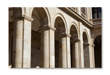 Obraz premium Architecture and heritage preservation, classic stone colonnade with arches in a historic building facade showing structural design and classical style