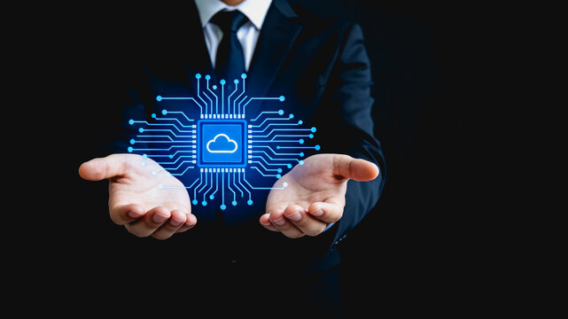 Businessman presenting cloud computing technology via virtual circuit chip