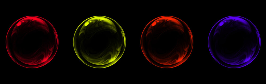 Set of four glowing colorful glossy spheres isolated on black background, abstract light orbs for design elements
