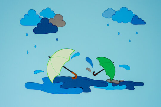 A vibrant background featuring clouds, umbrellas, and falling rain creates a lively scene