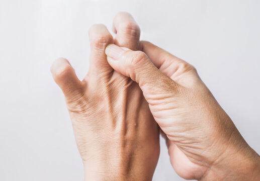 Close up of Finger of seniors who have problems trigger fingers
