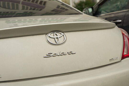 Tyumen, Russia-July 10, 2026: Toyota Solara SLE Chrome Emblem Logo on Car Trunk