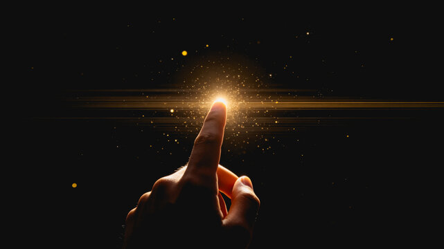 Human Finger Touching and Activating Bright Glowing Light Particle