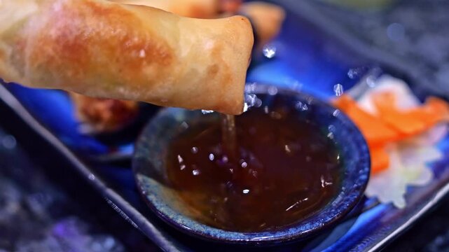 Close-up of assorted golden fried spring rolls with shrimp and vegetable fillings, arranged together as a crispy Asian-style appetizer with varied textures.
