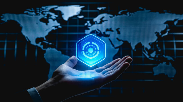 Businessperson Holding Glowing Global Technology Icon in Hand