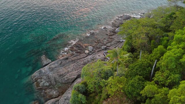 Aerial Phuket bay serene turquoise water, lush jungle. Perfect for vacation Freedom coral reef exploration