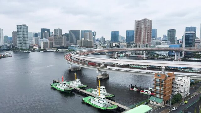 Shibaura Waterfront with Curved Elevated Highway and Boats in Tokyo