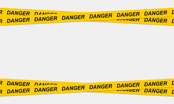 Yellow caution tape with repeating danger text stretches across a light gray background warning hazard security barrier restrict