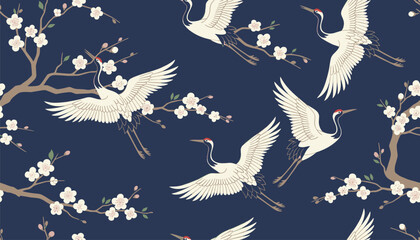 Fototapeta premium Cranes and cherry blossoms pattern featuring white cranes flying among pink cherry blossom branches on a deep dark blue background.