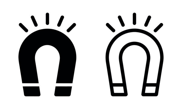 Black and white horseshoe magnet icons with light rays