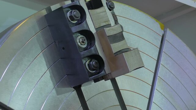 Working rotary table of a vertical turret lathe - workholding device in machining metalworking processes - close up
