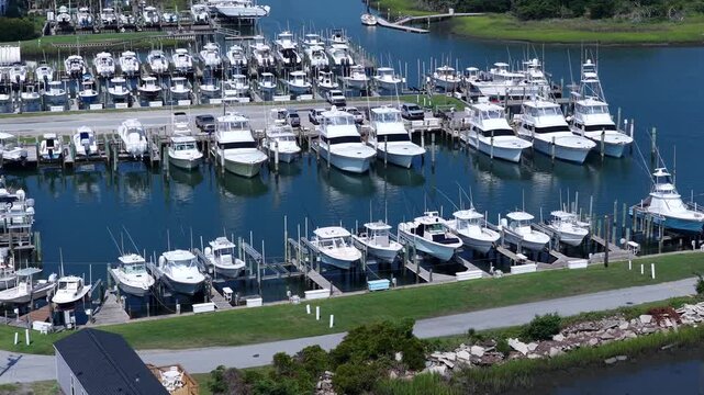 Atlantic City, North Carolina marina with boats docked in peaceful waterway on Crystal Coastline