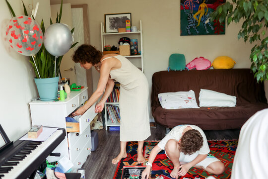 mother with son spending time at home