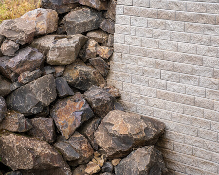 Rocks And Concrete Bricks Forming A Culvert Wall