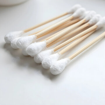 Personal hygiene and skincare routine, cotton swabs for ear cleaning and cosmetic application on a clean white surface for daily health maintenance